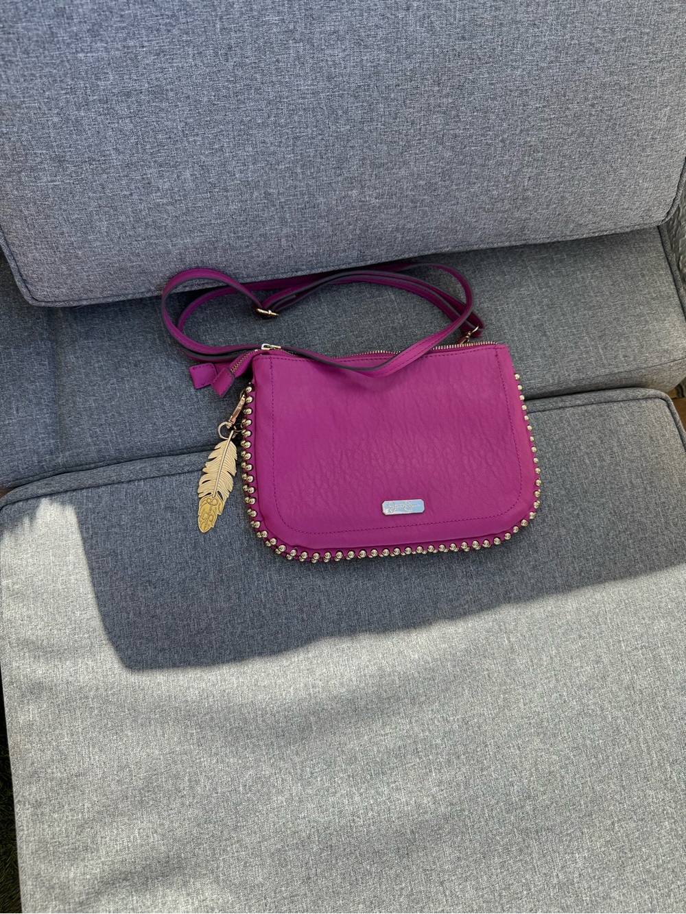 Jessica Simpson Magenta Crossbody Bag with Gold Feather Charm